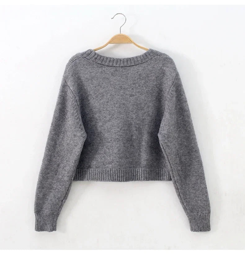 Élégance Tissée  – Le Cardigan Parfait pour un Hiver Chic